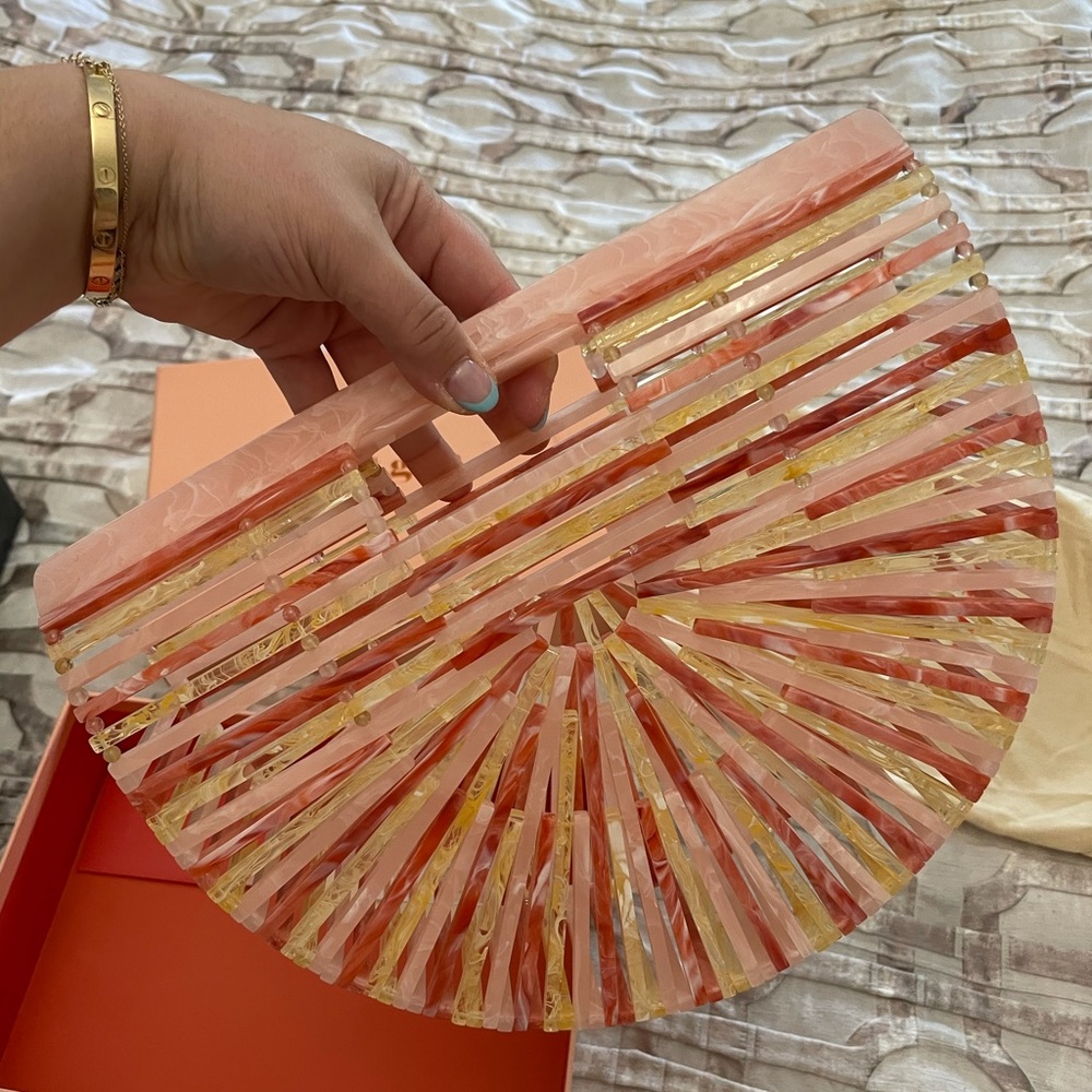 Cult Gaia acrylic arc handbag